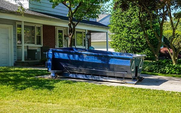 residential dumpsters can be placed on a driveway or yard, but safety measures need to be required to avoid damage to the property